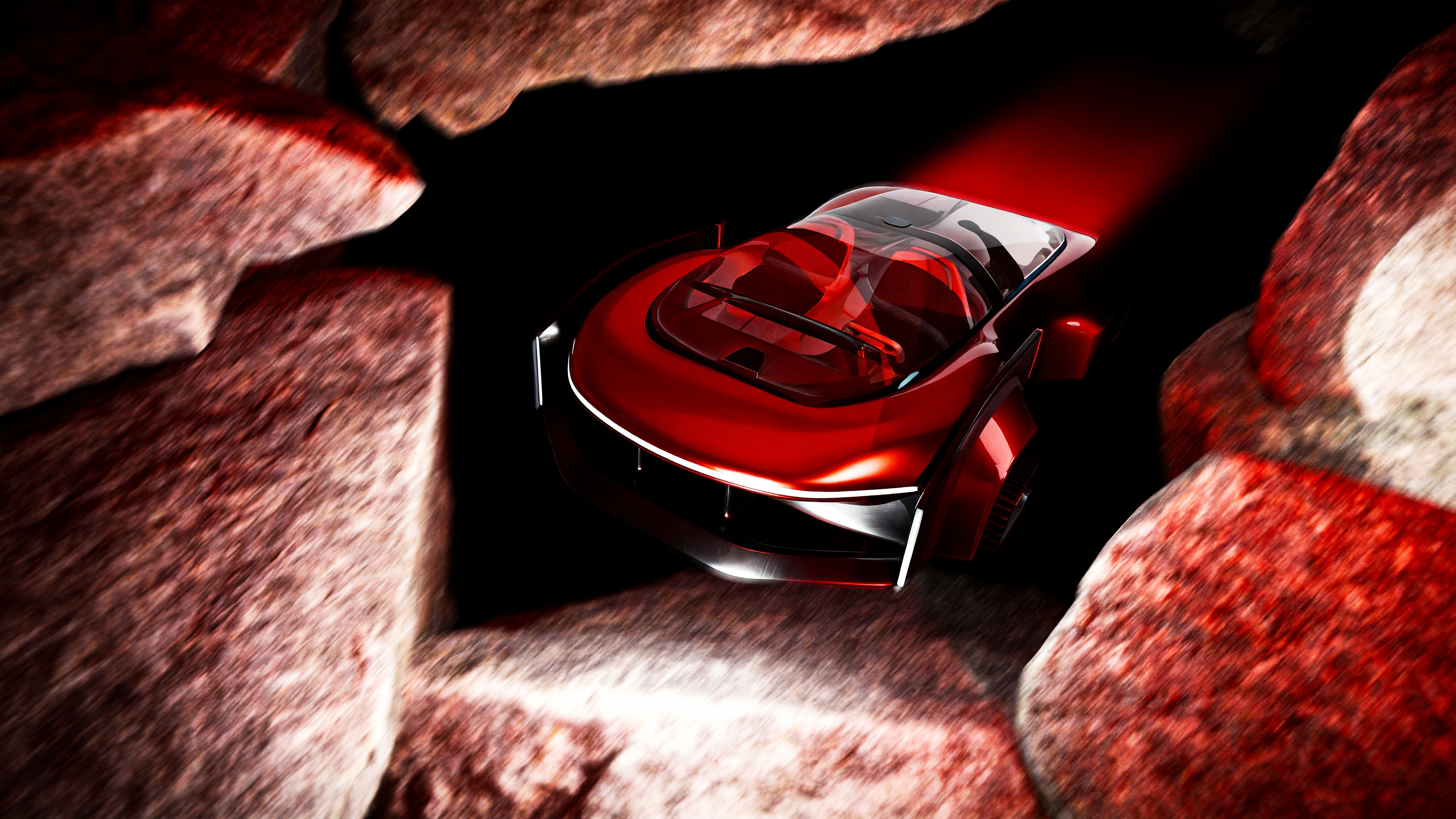 NIVIS — three-quarter view threading between rocks under emergency red light